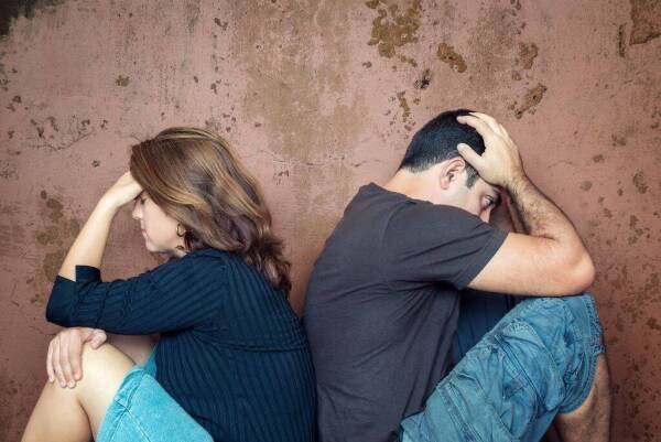 Divorce,fight,problems – Young couple angry at each other sittin
