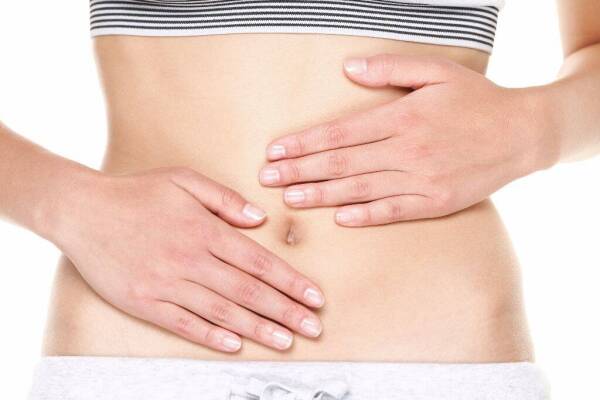 Stomach pain or menstrual pain. Woman with pains in abdomen. Fem
